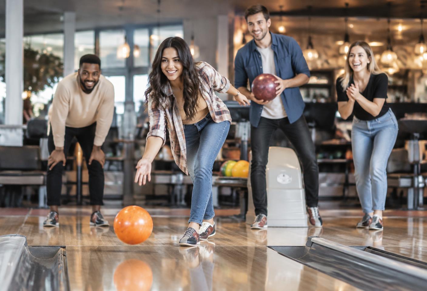 Friends bowling at River City Lanes